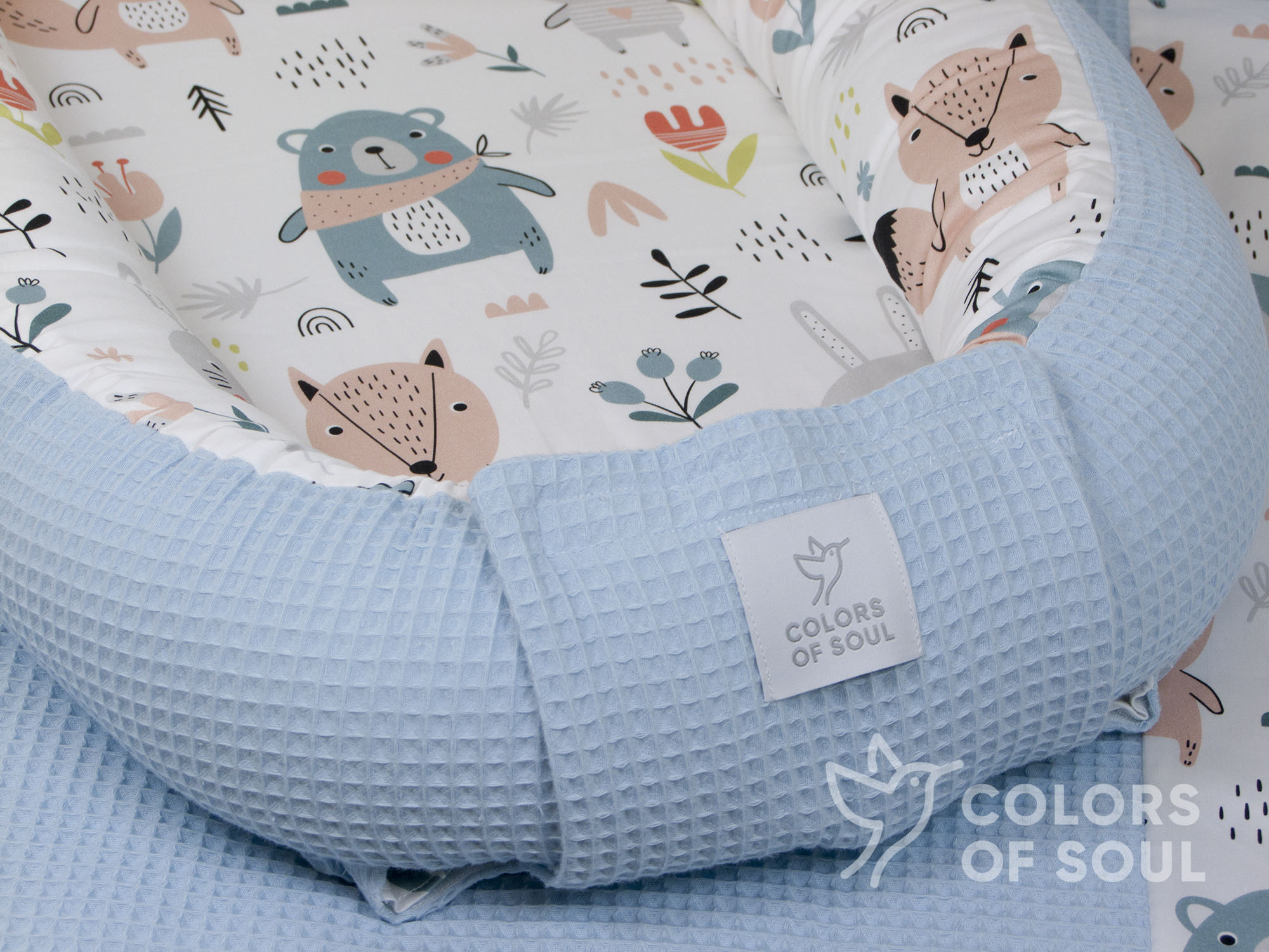 Babynestchen pastell Waldtiere / Waffelpique hellblau