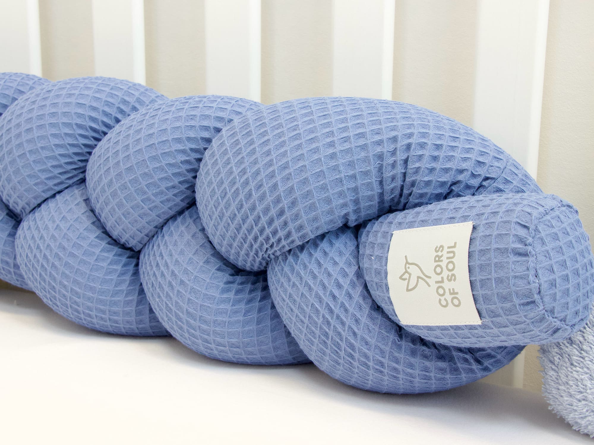 Geflochtene Bettschlange: Waffelpique blau