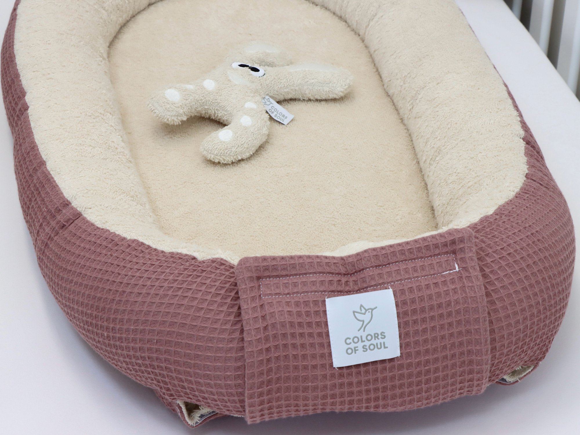 Babynest als mobiler Ruheplatz für Neugeborene