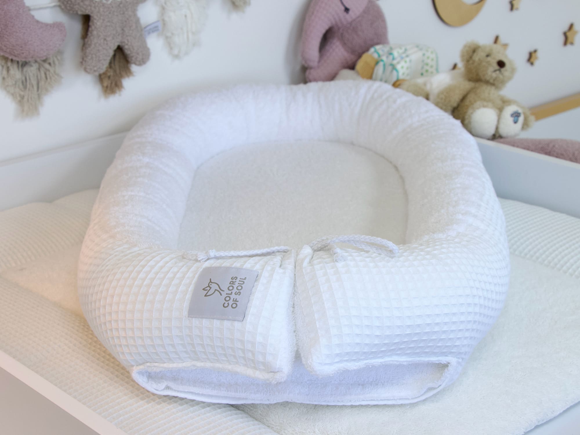 Hochwertiges Babynest aus Baumwolle – Frottee-Innenfläche für Geborgenheit und Wärme
