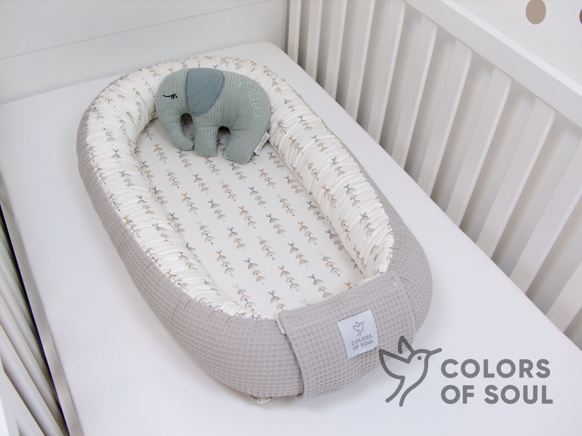 Babynestchen Mobile Regenbogen / Waffelpique beige