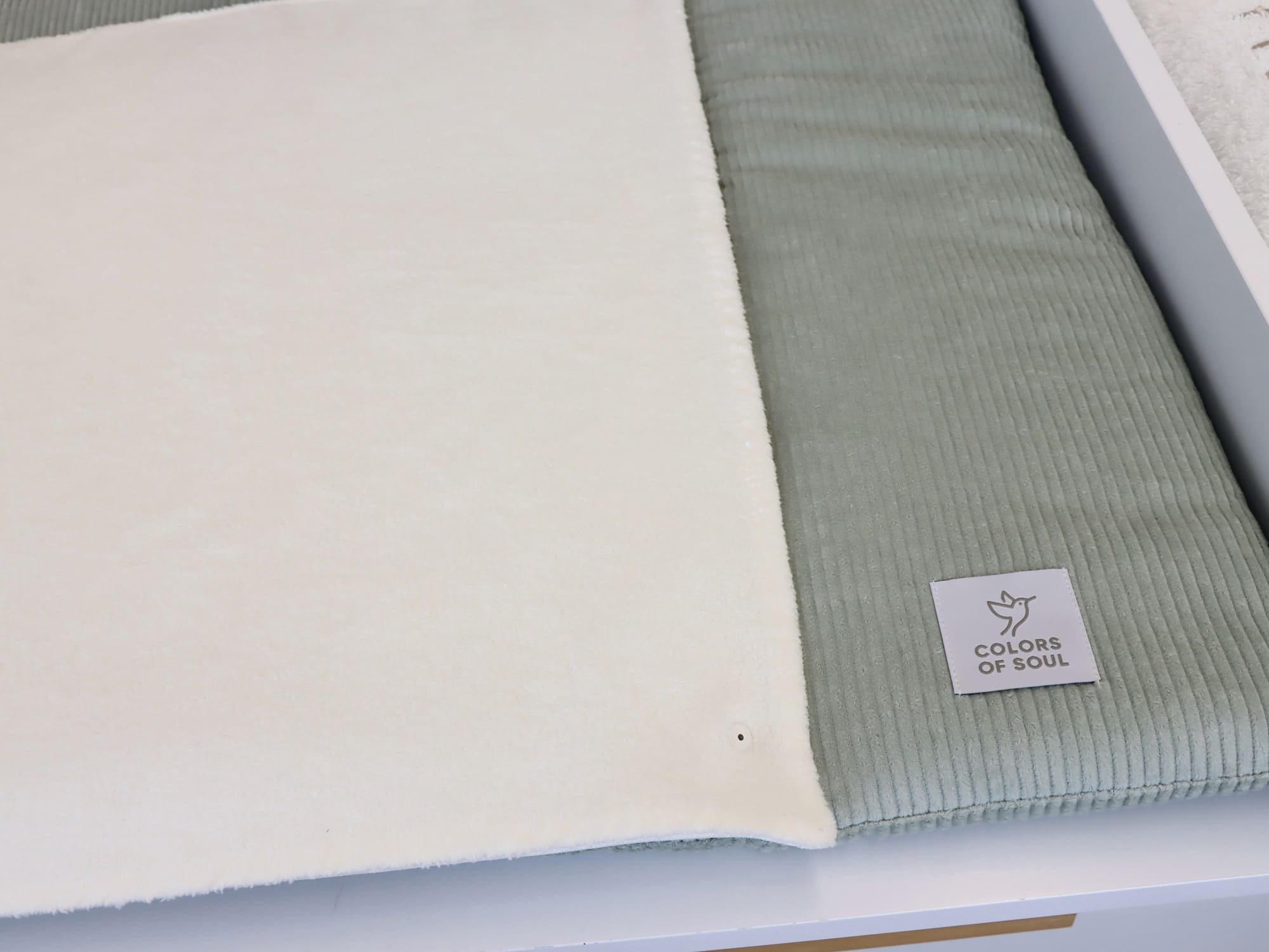 Gepolsterte Wickeltischauflage aus Cord in Mint