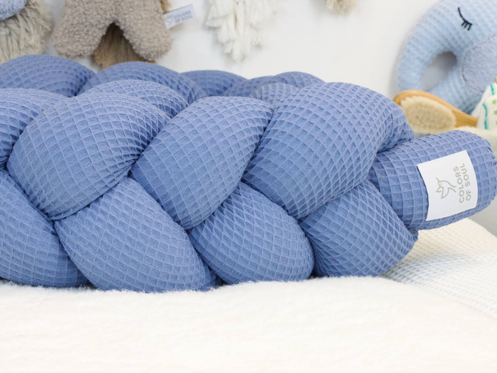 Geflochtene Bettschlange: Waffelpique blau