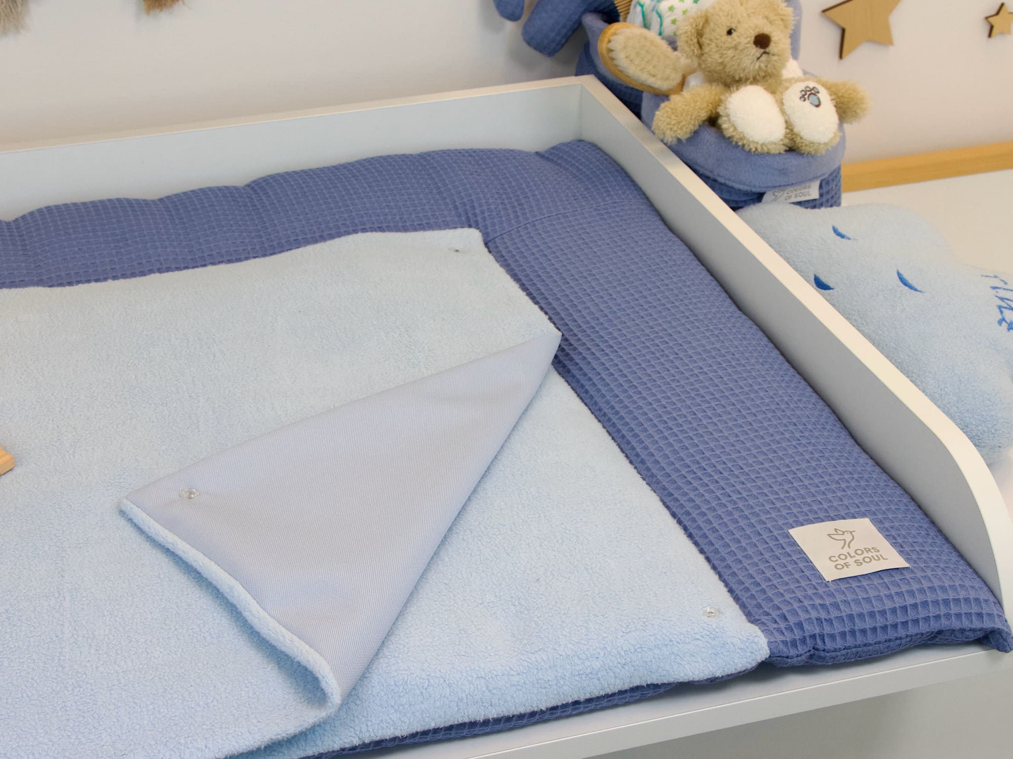 Wickeltischauflage aus Waffelpique Blau mit weichem Baumwollfleece