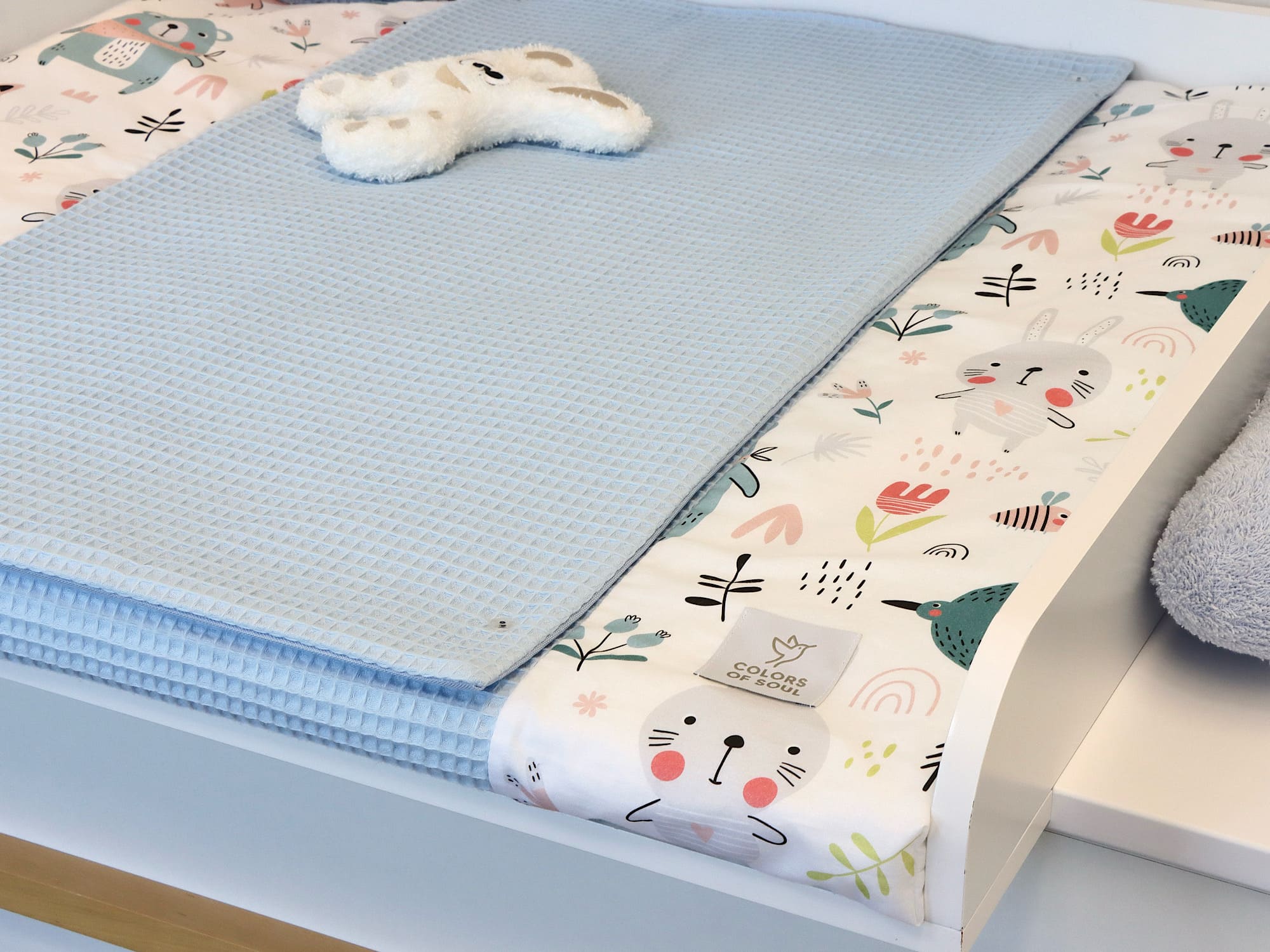 Wickelauflage mit Inlett - pastell Waldtiere / Waffelpique hellblau