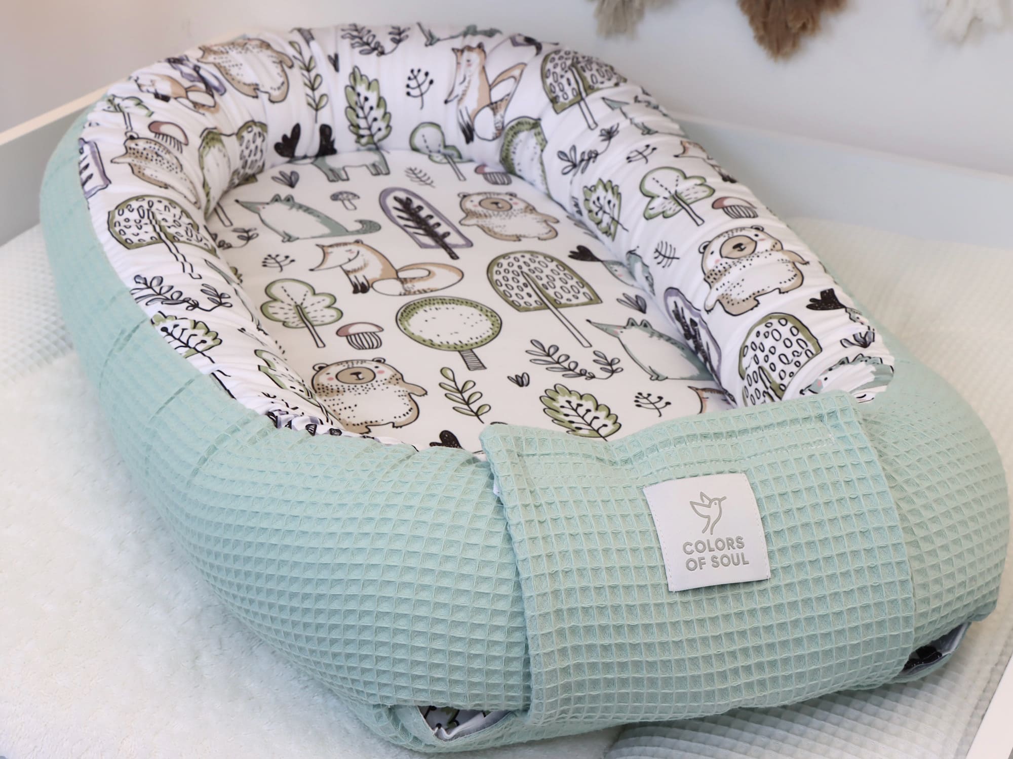 Babynestchen als mobiler Liegeplatz für Babys – Waffelpique Hellmint