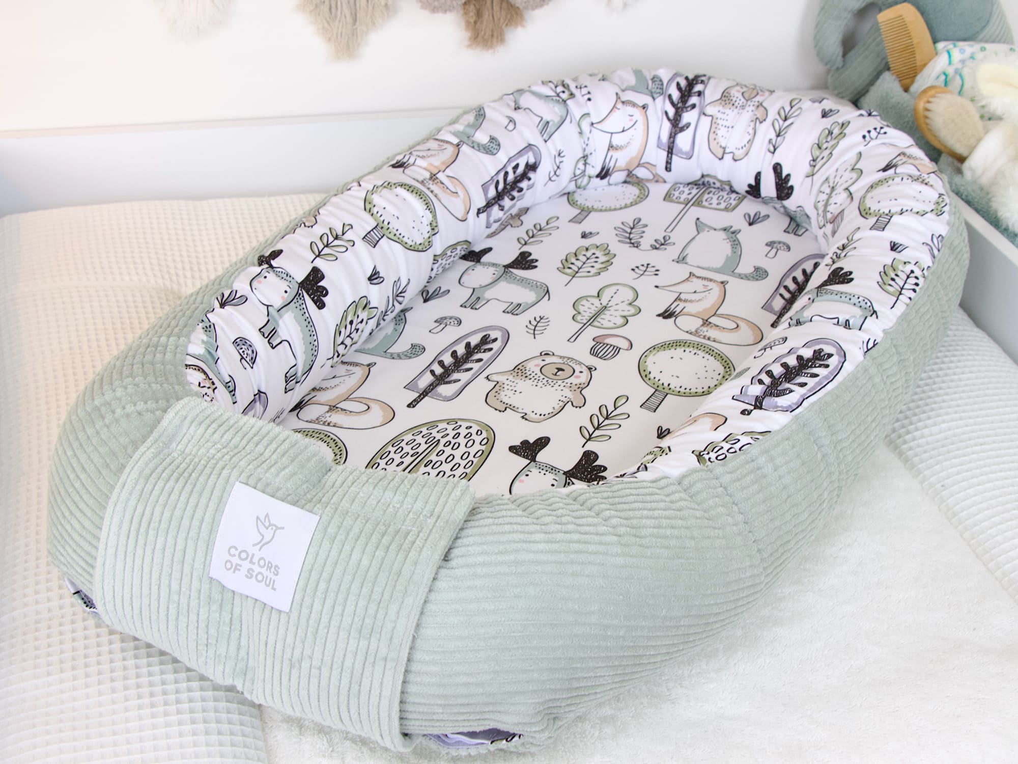 Babynest Cord mint und Waldfreunde