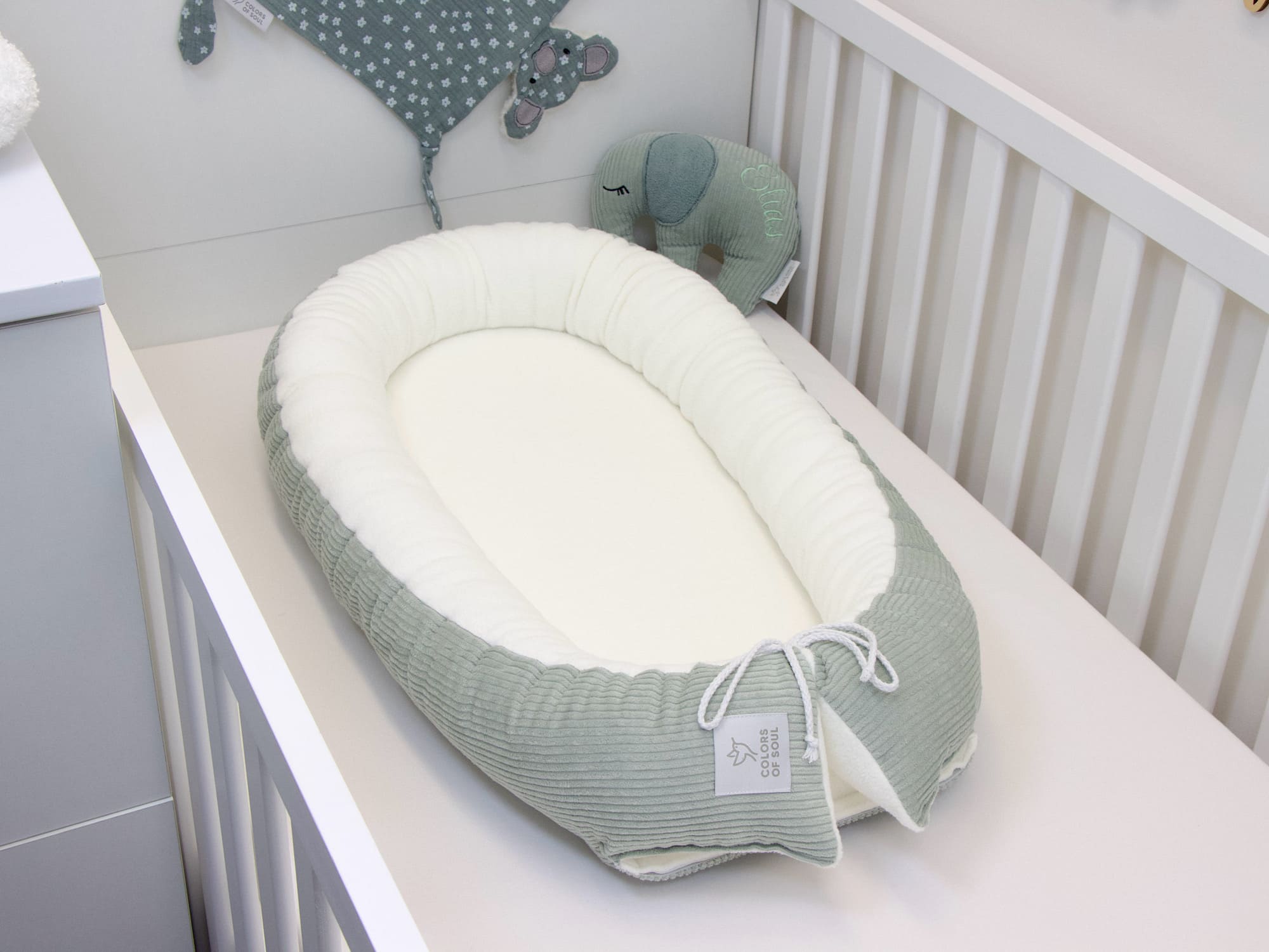 Kuscheliges Babynest mit weicher Fleece-Innenfläche