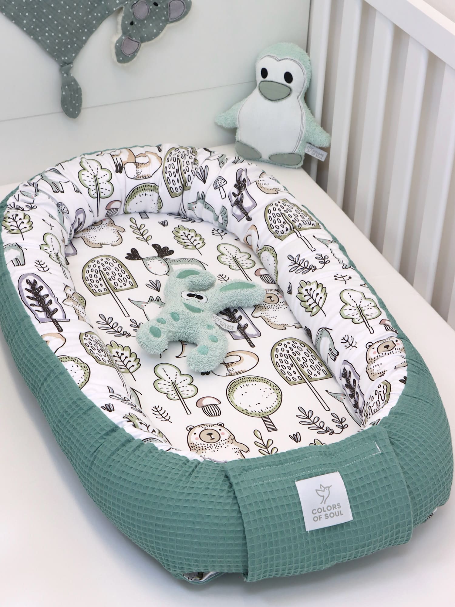 Handgefertigtes Babynestchen aus Baumwolle – ruhige Naturfarben
