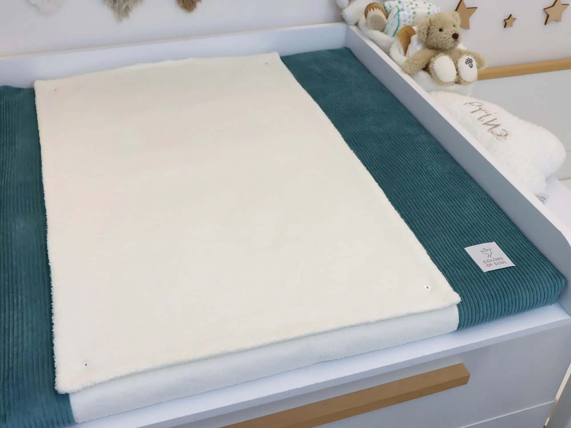 Wickelauflage mit wasserabweisendem Inlett in Petrol und Creme