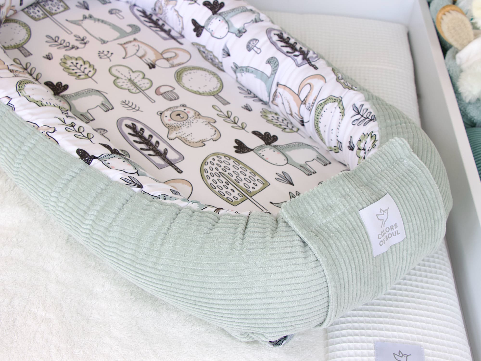 Babynest Cord mint und Waldfreunde