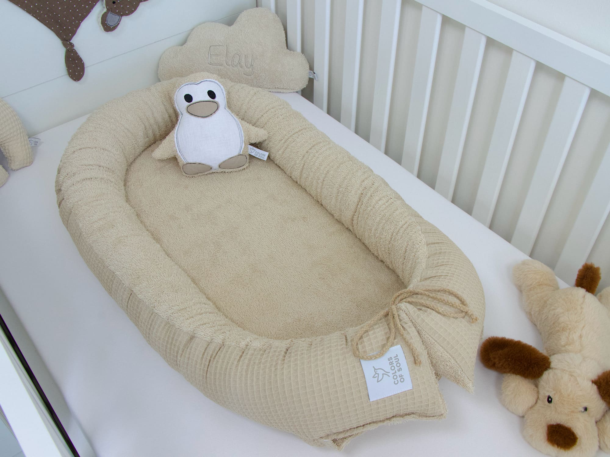 Kuscheliges Babynest in Beige – handgefertigt aus Baumwolle, perfekt für empfindliche Babyhaut